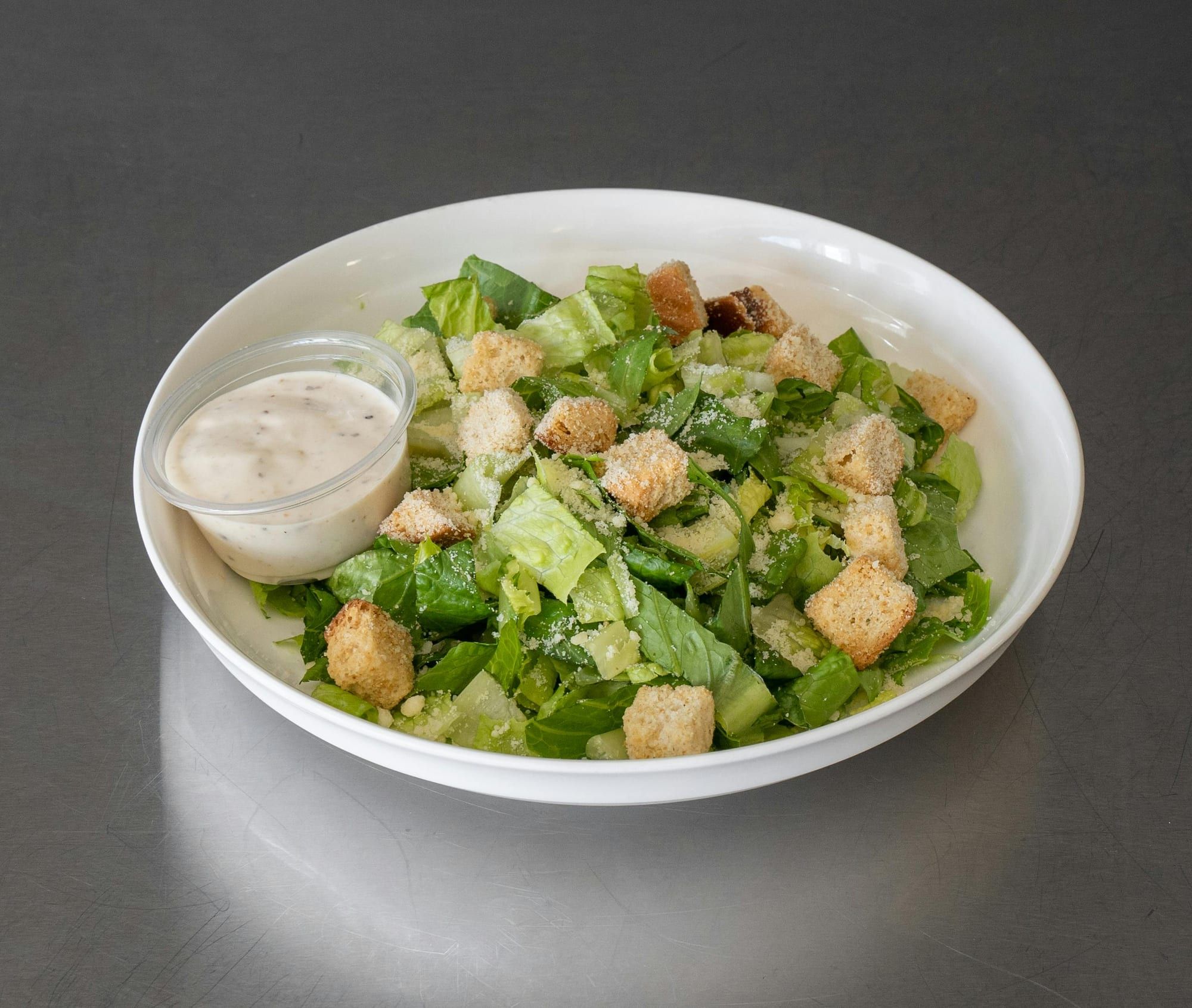 A Caesar salad with croutons